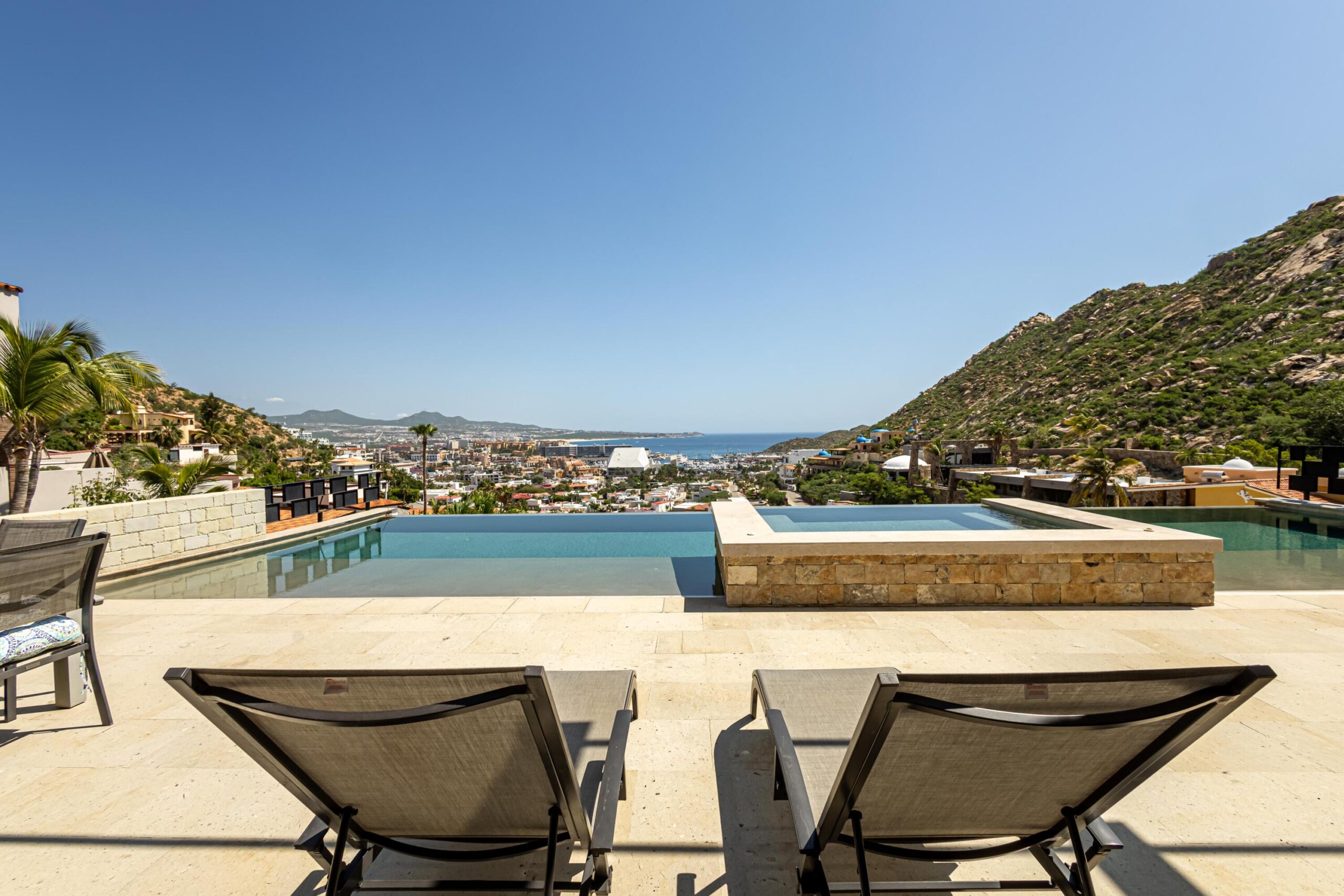 Cabo San Lucas Pedregal Csl Casa LA PIÑATA A luxury villa located in the exclusive Pedregal Cabo San Lucas. Perfect as a private residence or a high-end vacation rental, this villa offers an exceptional combination of comfort, style, privacy, and location.The villa features 8 bedrooms including a service room (as an independent apartment suite), 8.5 bathrooms, and 13 beds.Fully furnished and equipped with top-quality finishes, providing a turnkey experience.Every detail has been thoughtfully crafted to create an exceptional space for family gatherings and entertaining. The expansive terrace includes a great swimming pool, 2 jacuzzi, bar, 2 BBQ station, 2 fire pits, and multiple lounge areas, to enjoy the very best of Cabo living The interiors feature cozy and elegant living spaces, including a inside bar, games room, media room and impeccable design in every corner Fully furnished and equipped, representing an outstanding opportunity. With its exceptional design, amenities, and location, this villa embodies the best of the Baja lifestyle for sale