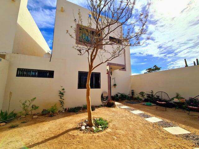 Cabo San Lucas Csl N-E Of19:Genral GREAT INVESTMENT OPPORTUNITY - ENDLESS POSSIBILITIES!Discover the untapped potential of Casa Altezza, a spacious single-family home nestled in a sought-after residential community in northern Cabo San Lucas, conveniently located off Highway 19 and Tamaral Ave. What sets this property apart? THE LARGEST LOT! in its phase, offering unique development potential! Expand the current home, add residential rental-rooms, design a covered garage, or build the ultimate entertainment space with seamless access--this property's extra land is a blank canvas for creativity and investment. Completed in April 2022, Casa Altezza features 3 bedrooms and 2.5 bathrooms, including an ensuite bath in the master bedroom. The home boasts a spacious front patio with mature plants and trees, along with a private back patio with partial concrete flooring.Several thoughtful upgrades include: - Custom-designed kitchen with a modern, minimalist concept and an expanded window for ample natural light. - Enclosed bonus room for laundry and storage. - High 2.5-meter privacy walls surrounding the property. - Iron-protected doors and windows with installed screens. - Abundant water supply with a total of 23,700 liters, including two cisterns and a rooftop water tank. - New appliances, including a full-size washer & dryer, stove, hood, refrigerator, two inverter mini-splits, and ceiling fans.Casa Altezza sits in an ideal location, just 10 minutes from downtown Cabo San Lucas, Medano Beach, Puerto Paraiso Mall, and The Marina. Daily conveniences like supermarkets, shopping centers, medical facilities, and schools are just minutes away. Plus, the community is a gated neighborhood with electronic access, and a remarkably low HOA monthly fee of only for sale
