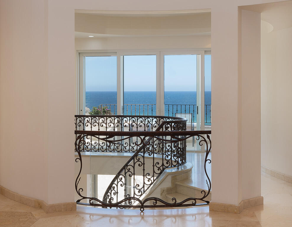 Cabo San Lucas Pedregal Csl Casa Agave presents a rare invitation to experience the raw beauty and vibrant life of the Pacific Ocean from a residence of contemporary distinction. Designed for those who seek both serene sanctuary and moments of shared delight, this seven-bedroom oceanfront home offers an unparalleled connection to the stunning Los Cabos coast.Imagine waking to the sound of waves, the horizon a canvas for breathtaking sunrises. At Casa Agave, the expansive living spaces seamlessly merge with the coastal landscape, offering uninterrupted for sale