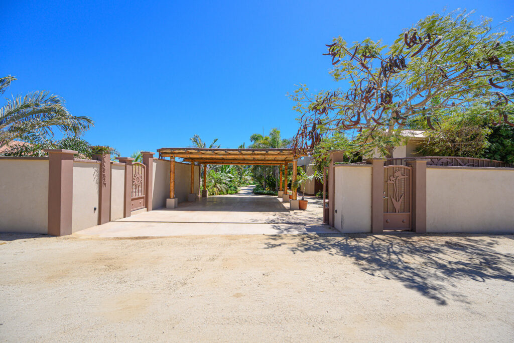 Cabo San Lucas Pedregal Csl Where the Pacific Becomes Your BackyardSome homes simply house you. This one transforms you.Perched in the coveted enclave of Pedregal -- Cabo San Lucas's most prestigious address -- this five-bedroom, six-and-a-half-bathroom estate is not just a property. It's a declaration. A fully furnished masterpiece where every room was designed with a single purpose: to make you feel like the most important person in the world, because here, you are.Step inside and the ocean doesn't just greet you -- it commands the room. A sweeping open-frame window turns the Sea of Cortez into living art, framed by handcrafted parota wood furniture that brings warmth, soul, and a sense of timeless Mexican craftsmanship to every gathering. Sunsets here aren't something you watch. They're something you host. The smart bedrooms offer panoramic ocean – 175 Camino Grande, Cabo San Lucas, BS