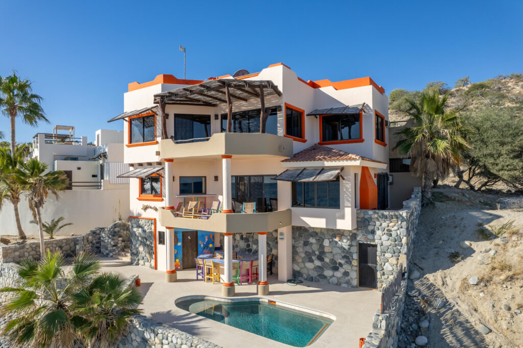 Cabo San Lucas Pedregal Csl Where the Pacific Becomes Your BackyardSome homes simply house you. This one transforms you.Perched in the coveted enclave of Pedregal -- Cabo San Lucas's most prestigious address -- this five-bedroom, six-and-a-half-bathroom estate is not just a property. It's a declaration. A fully furnished masterpiece where every room was designed with a single purpose: to make you feel like the most important person in the world, because here, you are.Step inside and the ocean doesn't just greet you -- it commands the room. A sweeping open-frame window turns the Sea of Cortez into living art, framed by handcrafted parota wood furniture that brings warmth, soul, and a sense of timeless Mexican craftsmanship to every gathering. Sunsets here aren't something you watch. They're something you host. The smart bedrooms offer panoramic ocean – 25 Camino Grande Pedregal, Cabo San Lucas, BS