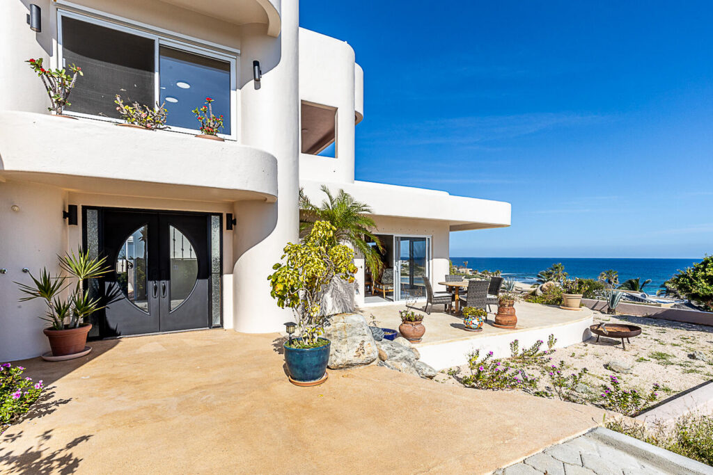 Cabo San Lucas Pedregal Csl Where the Pacific Becomes Your BackyardSome homes simply house you. This one transforms you.Perched in the coveted enclave of Pedregal -- Cabo San Lucas's most prestigious address -- this five-bedroom, six-and-a-half-bathroom estate is not just a property. It's a declaration. A fully furnished masterpiece where every room was designed with a single purpose: to make you feel like the most important person in the world, because here, you are.Step inside and the ocean doesn't just greet you -- it commands the room. A sweeping open-frame window turns the Sea of Cortez into living art, framed by handcrafted parota wood furniture that brings warmth, soul, and a sense of timeless Mexican craftsmanship to every gathering. Sunsets here aren't something you watch. They're something you host. The smart bedrooms offer panoramic ocean – 450 Cam. Del Sol, Cabo San Lucas, BS