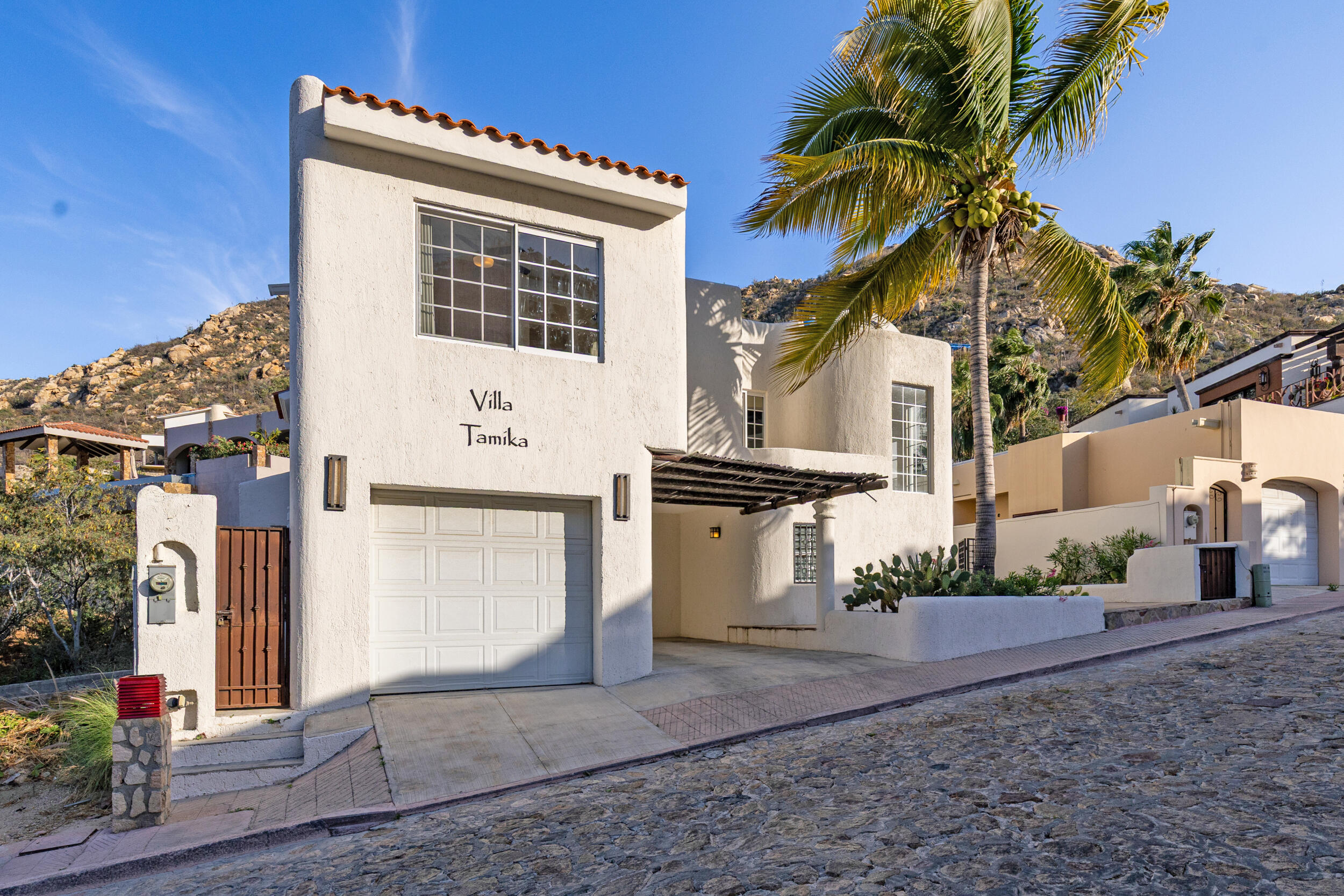 Cabo San Lucas Miramar Discover this stunning home located in the desirable Miramar area, thoughtfully designed to offer spacious living, comfort, and exceptional entertainment spaces.This beautiful two-story residence features 5 spacious bedrooms, 5 full bathrooms, and 1 half bathroom, with a modern layout that maximizes natural light and seamless indoor-outdoor living.The main level includes a fully equipped modern kitchen, open-concept living and dining areas, a convenient laundry room, and a two-car garage. Large windows and well-designed spaces create a bright and welcoming atmosphere throughout the home. The highlight of the property is its impressive rooftop entertainment area, perfect for hosting family and friends. It features a built-in BBQ grill, sink, two additional half bathrooms, a cozy fire pit, and a beautiful swimming pool, creating the ideal setting to enjoy outdoor living and breathtaking sunsets.Located in a peaceful and growing neighborhood, Miramar offers convenient access to schools, shopping centers, restaurants, beaches, and the main roads connecting all of Los Cabos. for sale