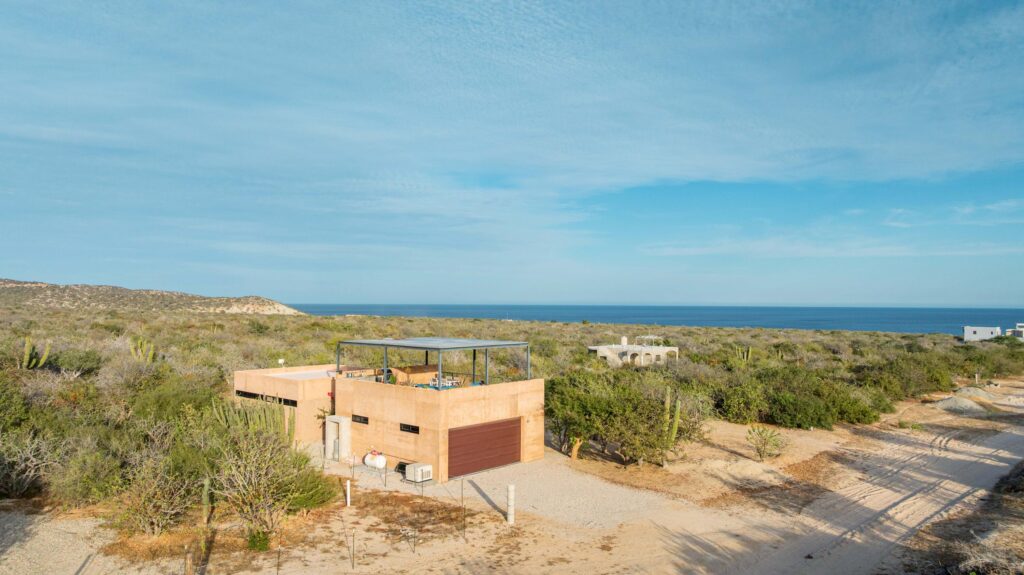 Cabo San Lucas Pedregal Csl Where the Pacific Becomes Your BackyardSome homes simply house you. This one transforms you.Perched in the coveted enclave of Pedregal -- Cabo San Lucas's most prestigious address -- this five-bedroom, six-and-a-half-bathroom estate is not just a property. It's a declaration. A fully furnished masterpiece where every room was designed with a single purpose: to make you feel like the most important person in the world, because here, you are.Step inside and the ocean doesn't just greet you -- it commands the room. A sweeping open-frame window turns the Sea of Cortez into living art, framed by handcrafted parota wood furniture that brings warmth, soul, and a sense of timeless Mexican craftsmanship to every gathering. Sunsets here aren't something you watch. They're something you host. The smart bedrooms offer panoramic ocean – M22, L4 Calle Quinta Arizona, Cabo San Lucas, BS