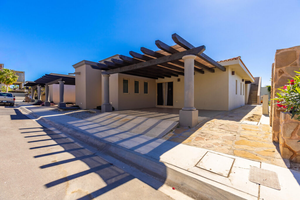Cabo San Lucas Pedregal Csl Where the Pacific Becomes Your BackyardSome homes simply house you. This one transforms you.Perched in the coveted enclave of Pedregal -- Cabo San Lucas's most prestigious address -- this five-bedroom, six-and-a-half-bathroom estate is not just a property. It's a declaration. A fully furnished masterpiece where every room was designed with a single purpose: to make you feel like the most important person in the world, because here, you are.Step inside and the ocean doesn't just greet you -- it commands the room. A sweeping open-frame window turns the Sea of Cortez into living art, framed by handcrafted parota wood furniture that brings warmth, soul, and a sense of timeless Mexican craftsmanship to every gathering. Sunsets here aren't something you watch. They're something you host. The smart bedrooms offer panoramic ocean – Pedregal Townhome, Cabo San Lucas, Cabo San Lucas, BS